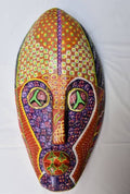Ada di ike - Guerrera, a hand-carved MASK-WE Gmelina wood mask painted by Kosisochukwu Chiedozie
