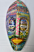 Akwali Omumu -Fertilidad, a hand-carved MASK-WE Gmelina wood mask painted by Iruoma Eunice Onuorah Emesiana