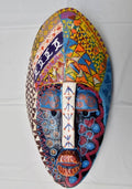 Odum Nwanyi - Leona, a hand-carved MASK-WE Gmelina wood mask painted by Martha Nneka Nnebedum