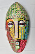 Ugwunnemmaa – La madre de las mascaradas, a hand-carved MASK-WE Gmelina wood mask painted by Promise Onoh